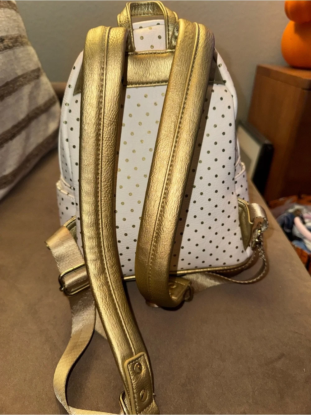 Loungefly White & Gold Mini Backpack with Decorative Face Motif